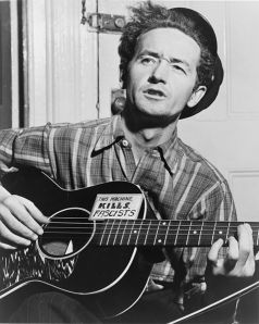 477px-Woody_Guthrie_NYWTS